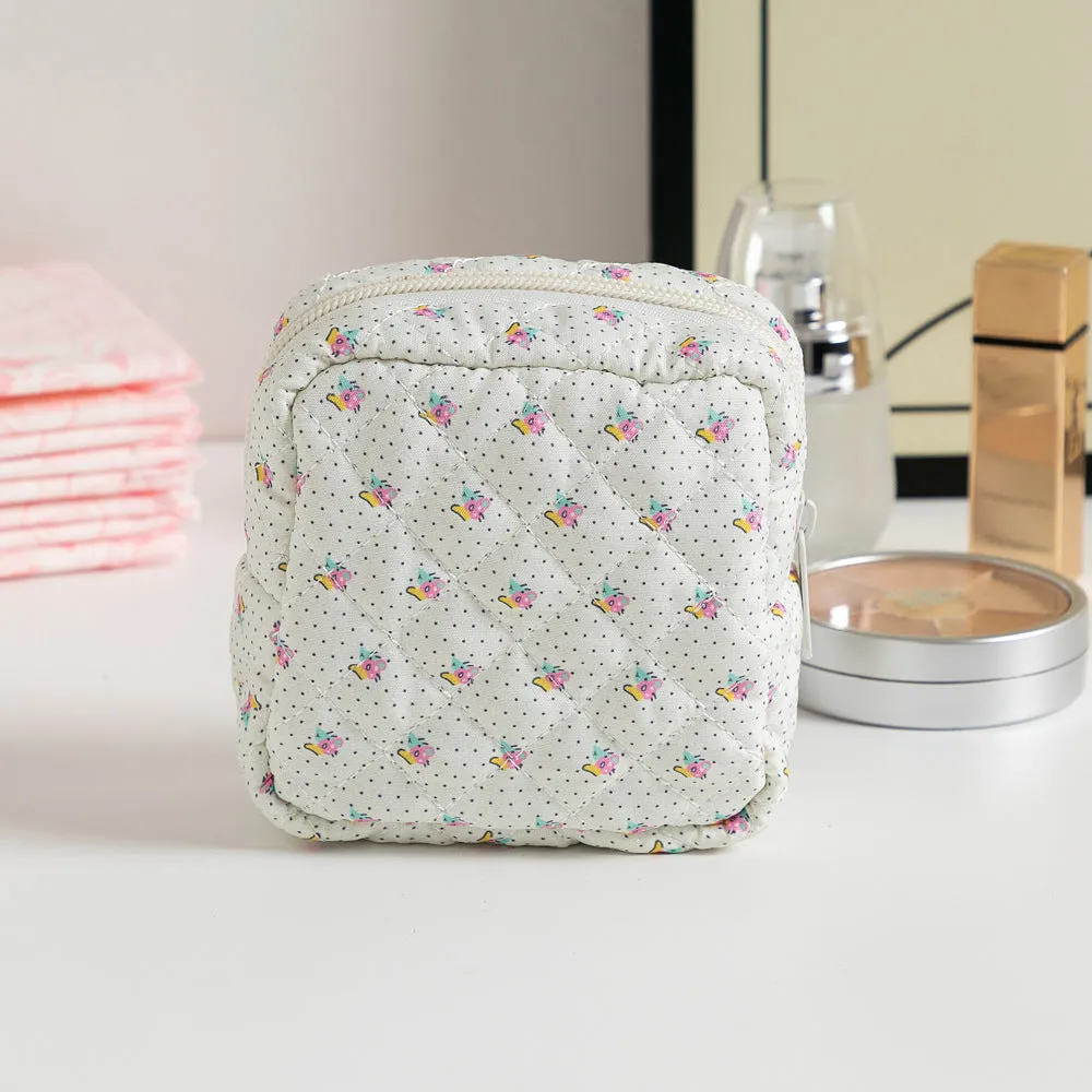 Cute Change women's key storage bag in a floral print made from breathable polyester fabric.