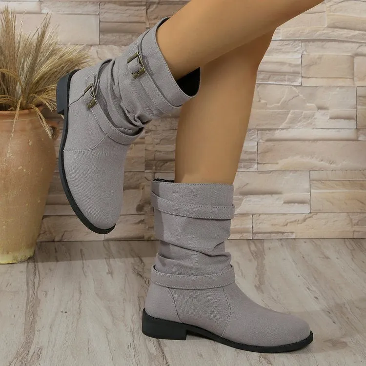 Square heel round toe women's boots in brown artificial PU with leather stitching and rubber sole