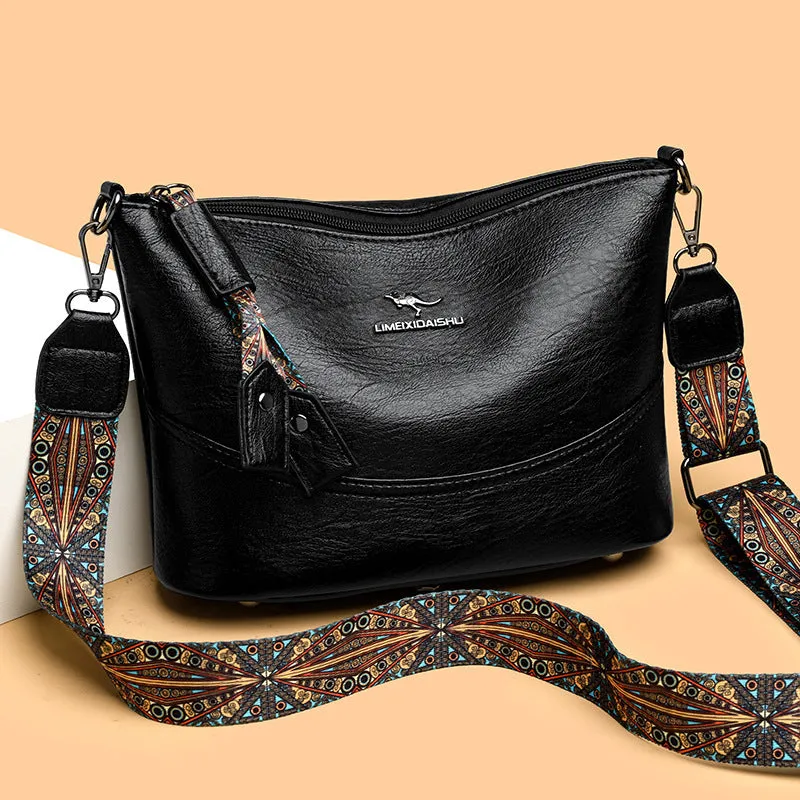 Women's bucket bag in PU leather, crossbody style, outer pocket, black colour, horizontal square shape