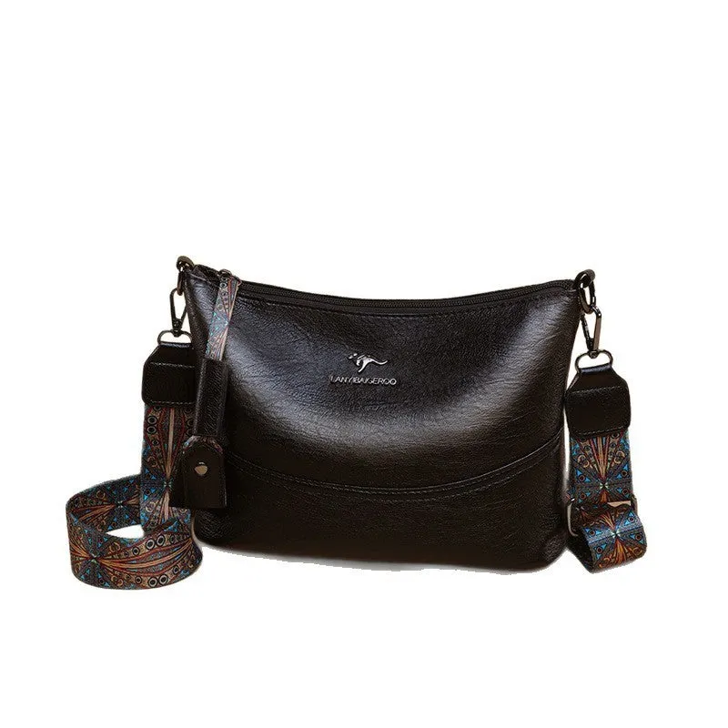 Women's bucket bag in PU leather, crossbody style, outer pocket, black colour, horizontal square shape
