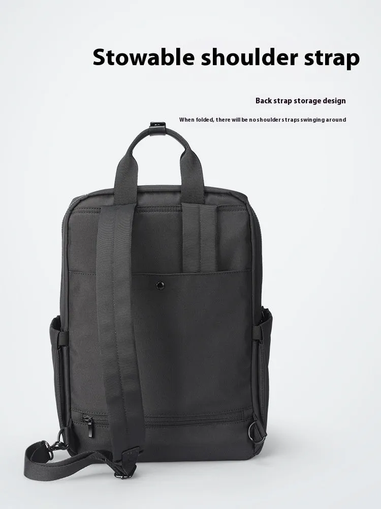 Elegant black Oxford cloth computer backpack with a capacity of 20-35 litres.