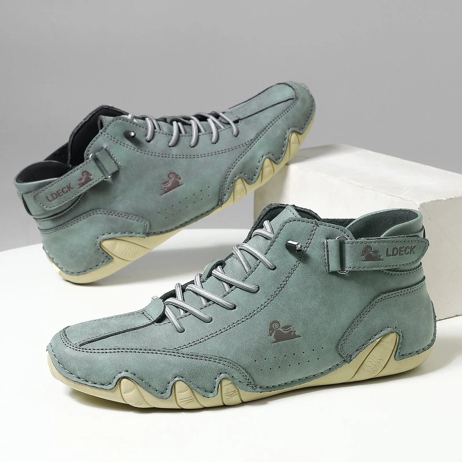 Men's khaki high-top ankle boots with round toe and flat heel on a white background.