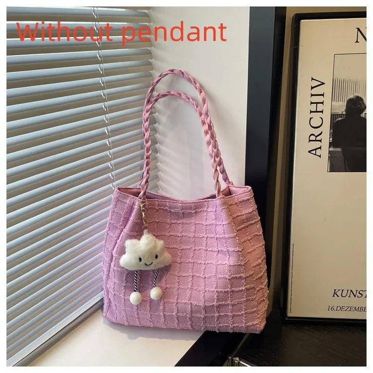 Women's canvas shoulder messenger bag large bucket shape with magnetic clasp and phone pocket, available in black, blue, pink, white.