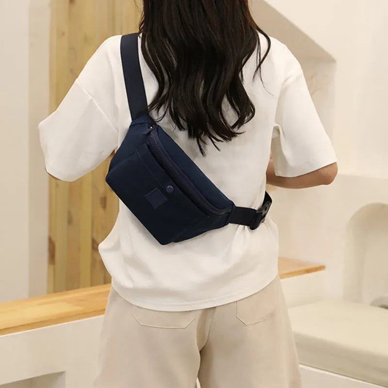 Large capacity crossbody nylon fanny pack for women in eight colours with zipper closure and internal pockets for running and travel
