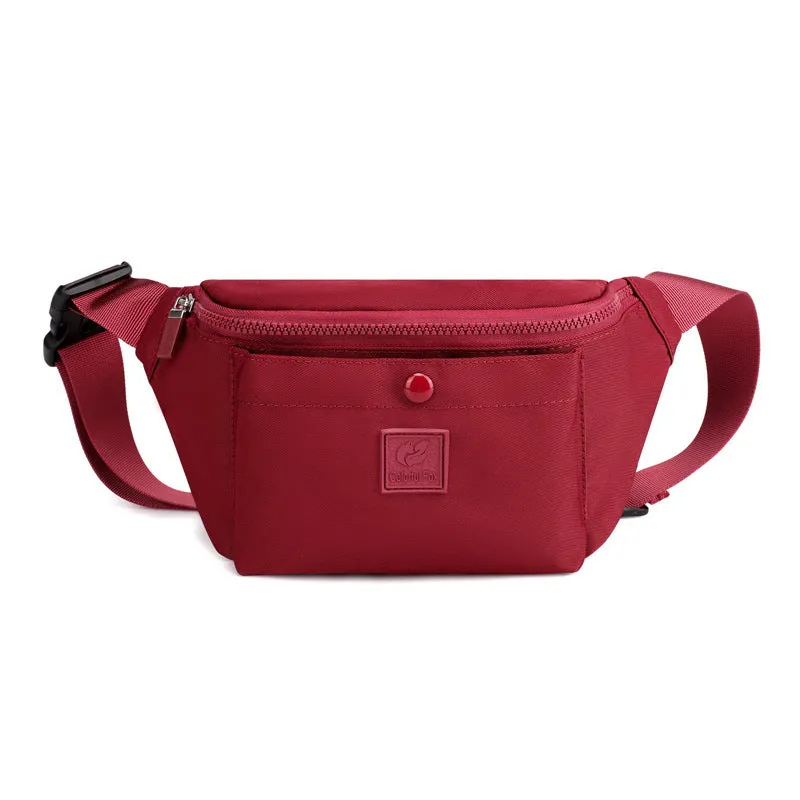 Large capacity crossbody nylon fanny pack for women in eight colours with zipper closure and internal pockets for running and travel
