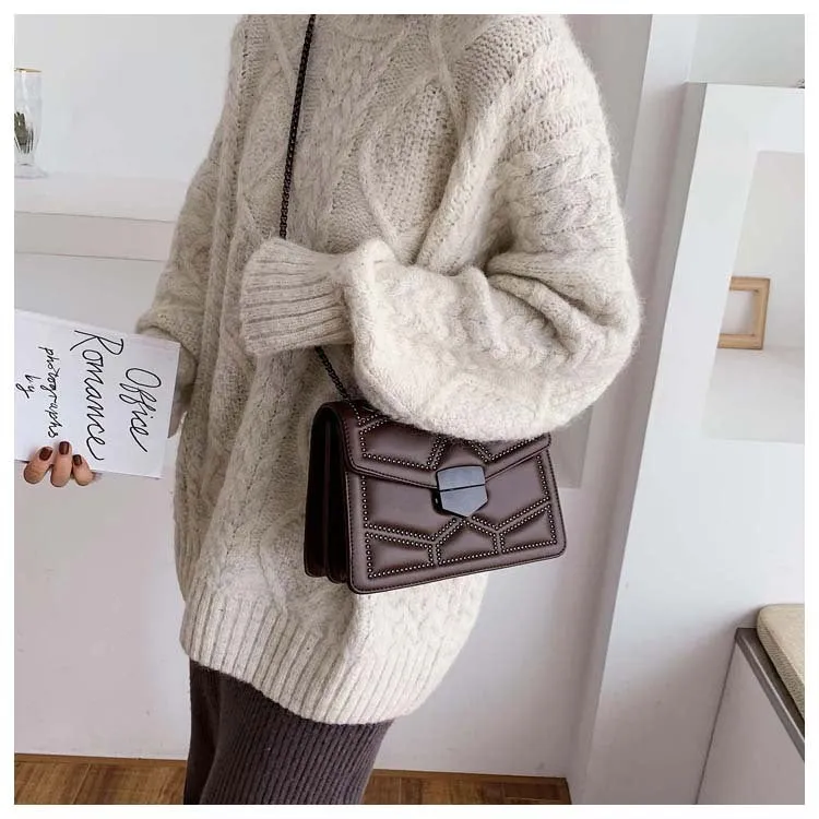 Small square PU shoulder bag with gold rivet studs, chain handle and zipper closure, available in four colours