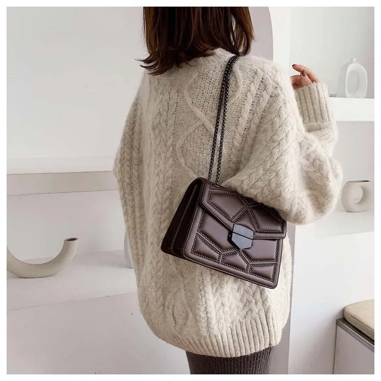 Small square PU shoulder bag with gold rivet studs, chain handle and zipper closure, available in four colours