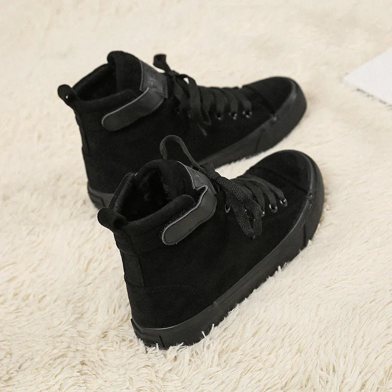 Women's high-top canvas shoes with velcro strap, black colour, rubber sole on a plain background