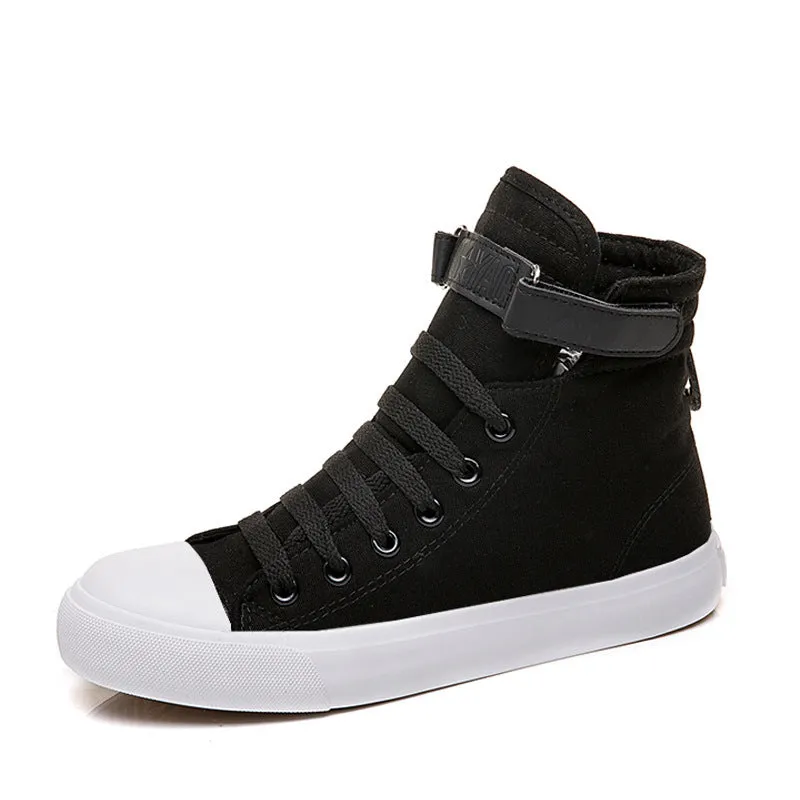 Women's high-top canvas shoes with velcro strap, black colour, rubber sole on a plain background