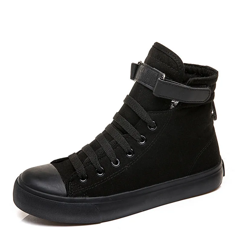 Women's high-top canvas shoes with velcro strap, black colour, rubber sole on a plain background