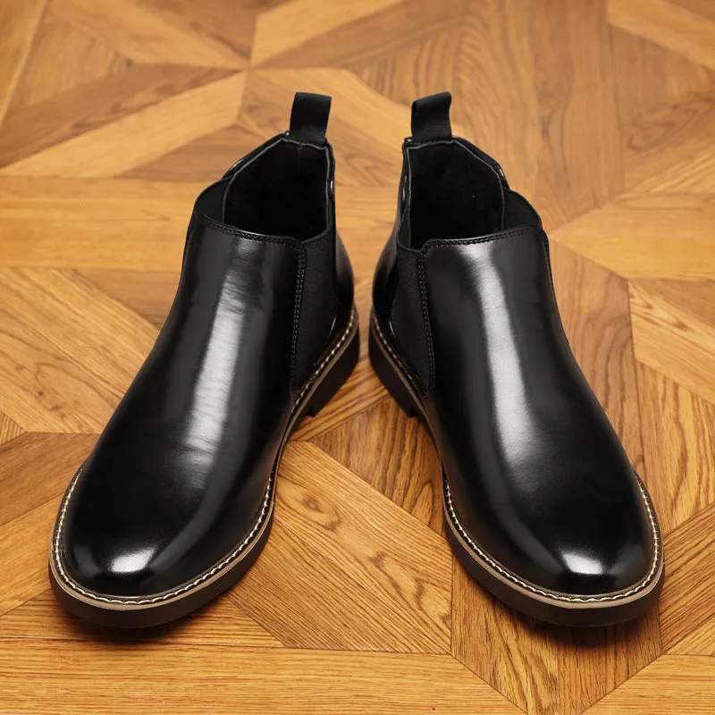 Men's black formal pointed-toe leather boots with a square rubber heel.