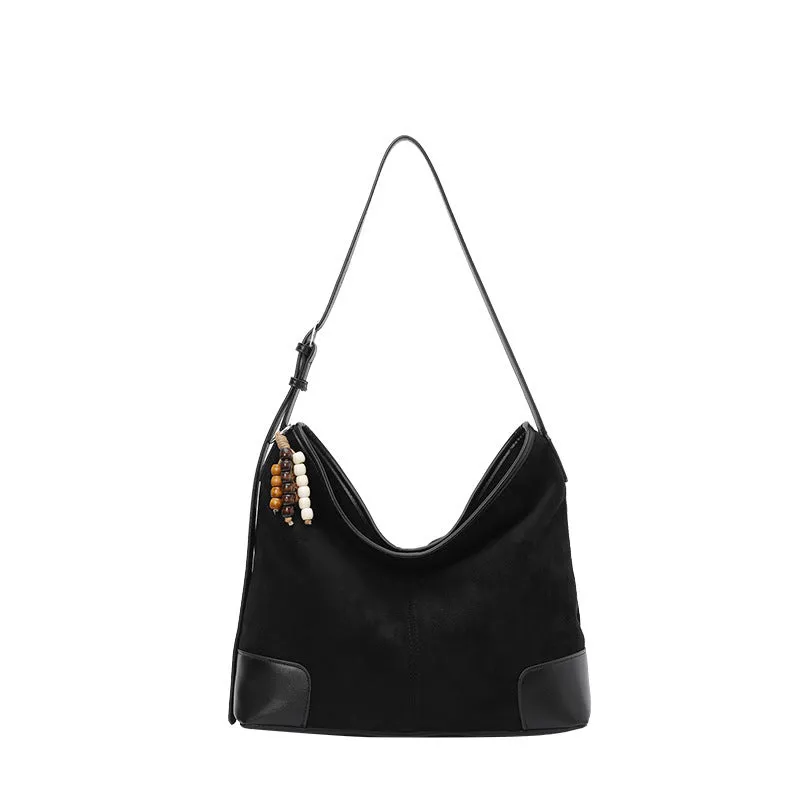 Women's PU leather retro shoulder crossbody bag in brown with ribbon pendant, horizontal shape, sandwich pocket