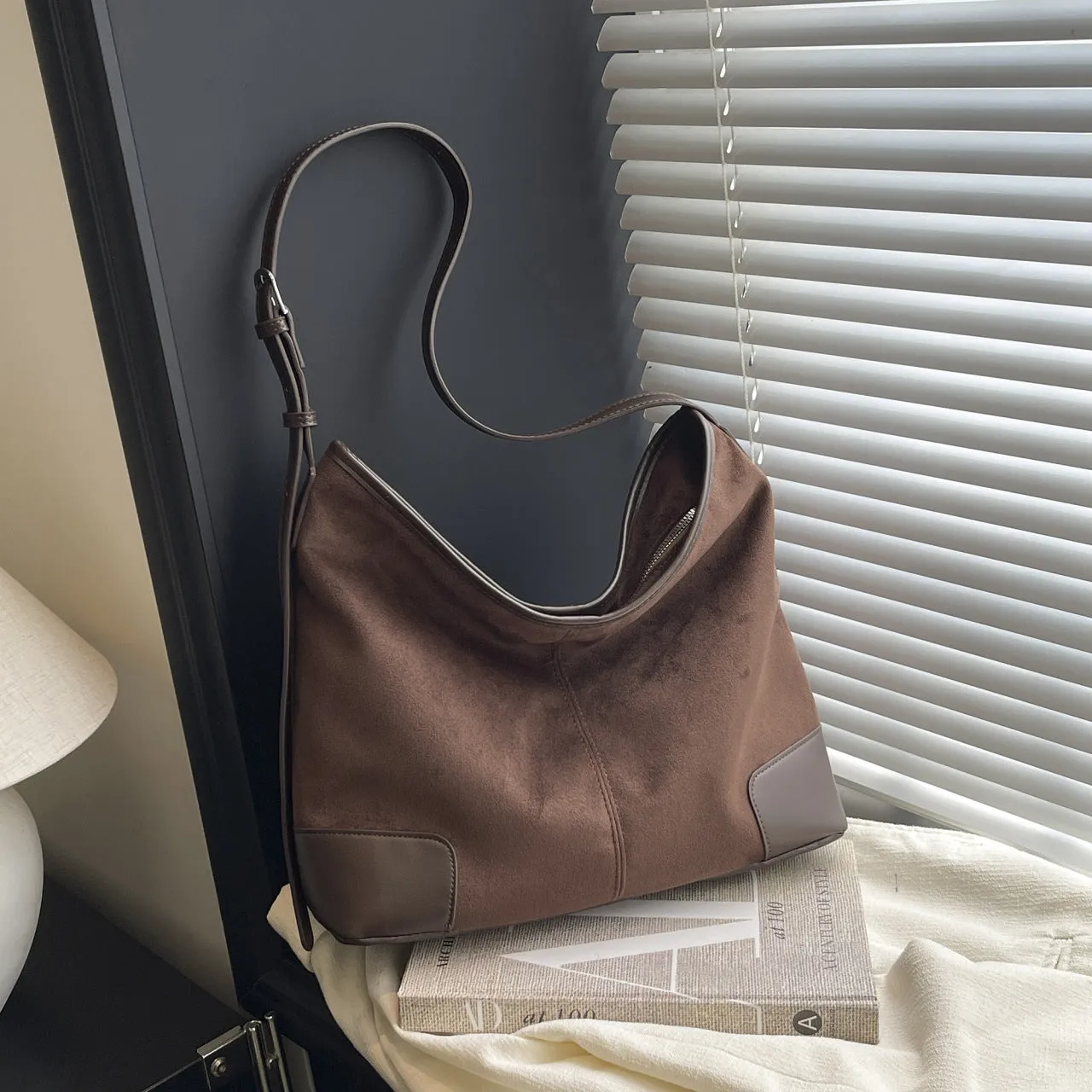 Women's PU leather retro shoulder crossbody bag in brown with ribbon pendant, horizontal shape, sandwich pocket