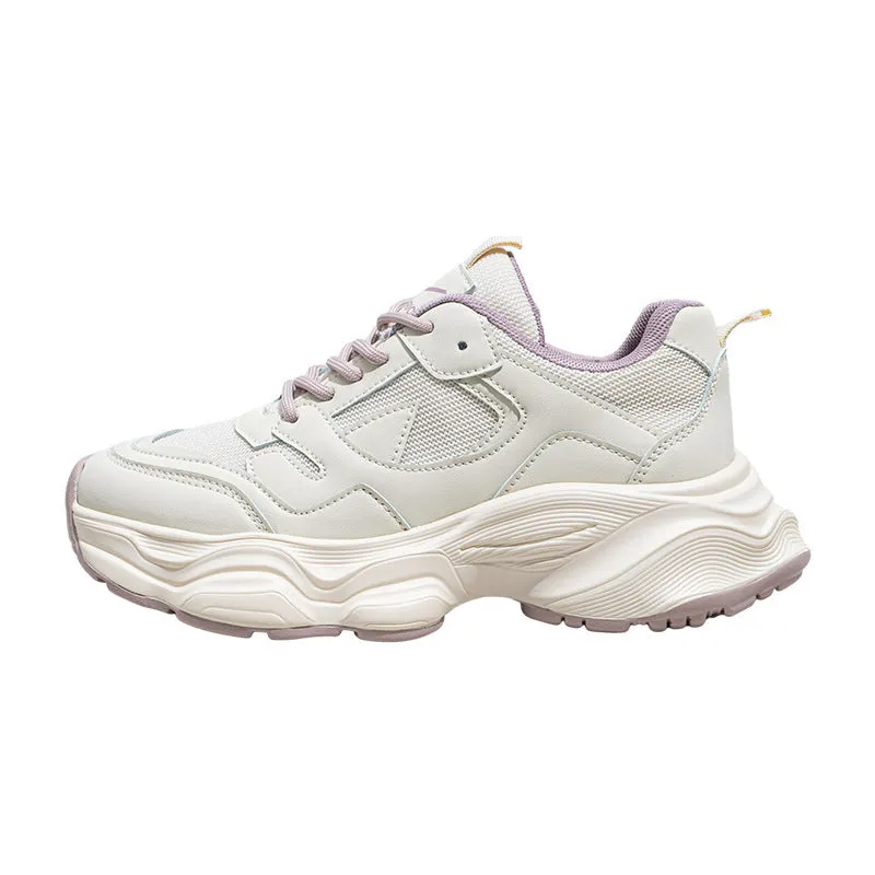 Women's breathable mesh white sneakers with flat heel, round toe, and lace-up closure