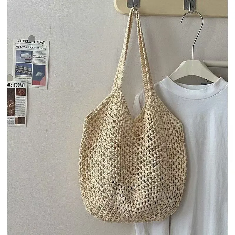 Hand-woven hollow shoulder bag in cotton and linen, beige colour, open pocket design with double straps