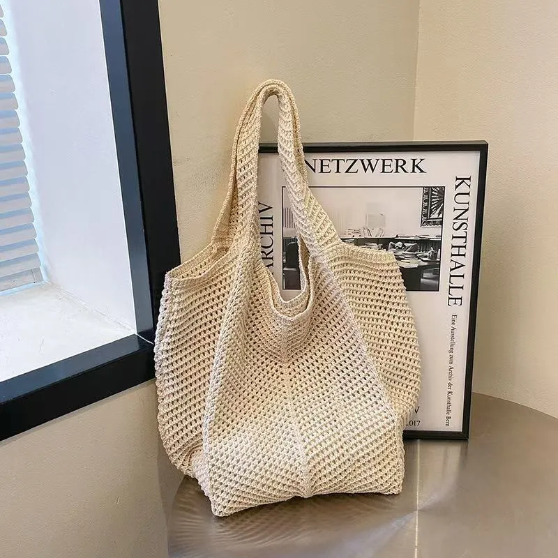 Hand-woven hollow shoulder bag in cotton and linen, beige colour, open pocket design with double straps