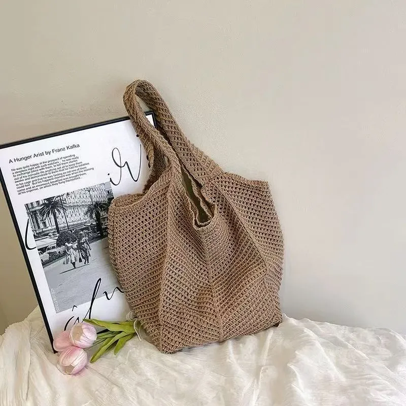 Hand-woven hollow shoulder bag in cotton and linen, beige colour, open pocket design with double straps