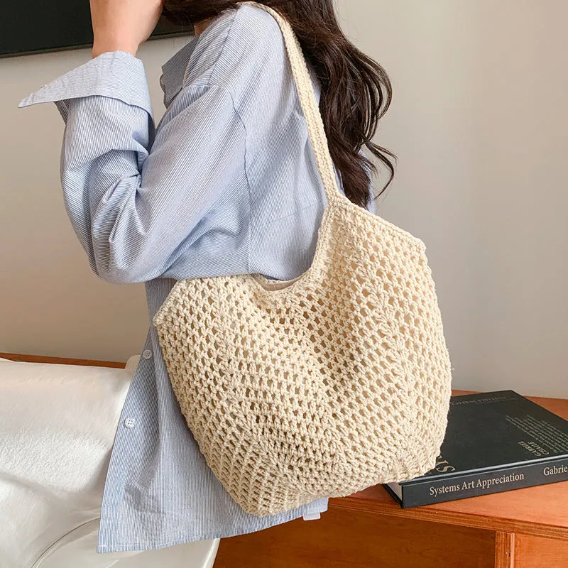 Hand-woven hollow shoulder bag in cotton and linen, beige colour, open pocket design with double straps