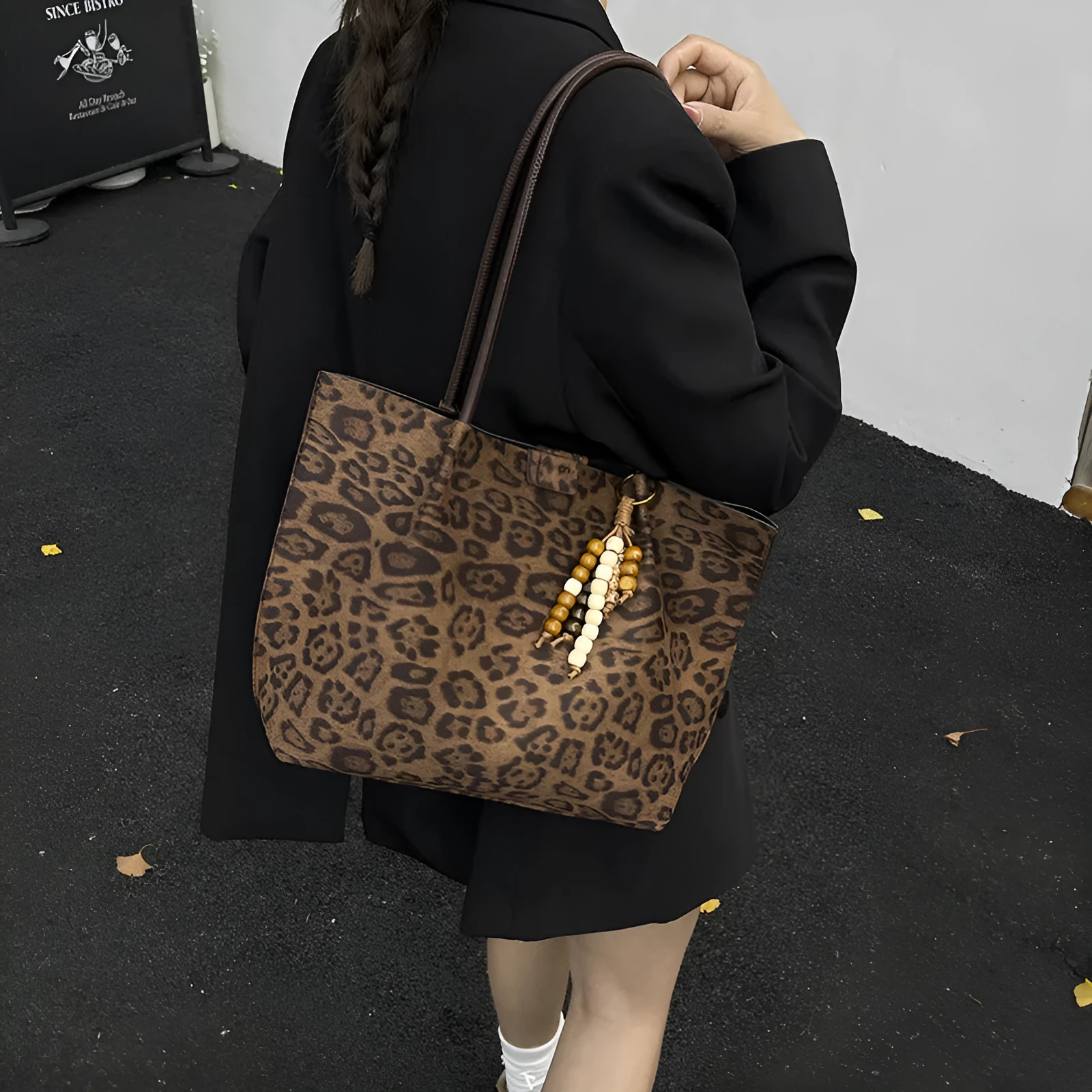 Leopard print polyester hand-held tote bag with double shoulder straps on a white background