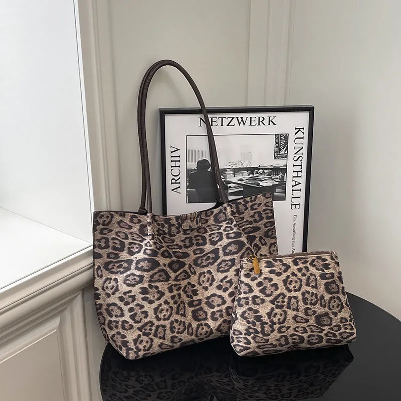Leopard print polyester hand-held tote bag with double shoulder straps on a white background
