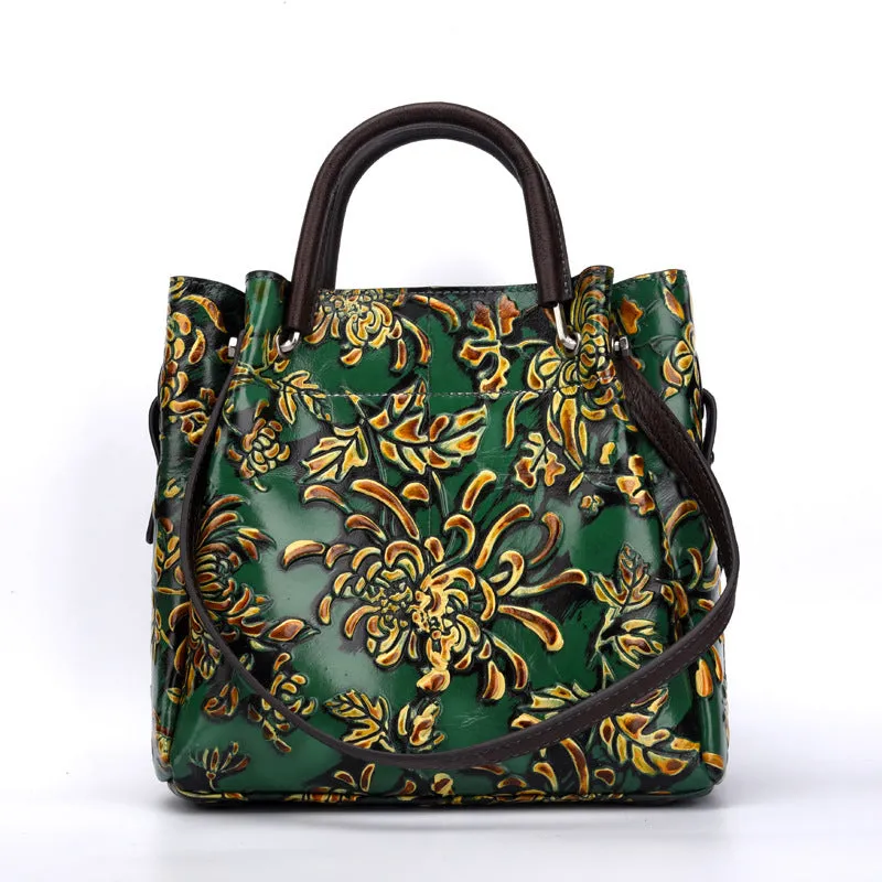 First layer cowhide women's messenger bag with embossed floral pattern, retro square shape, hard handle, and single shoulder strap in brown