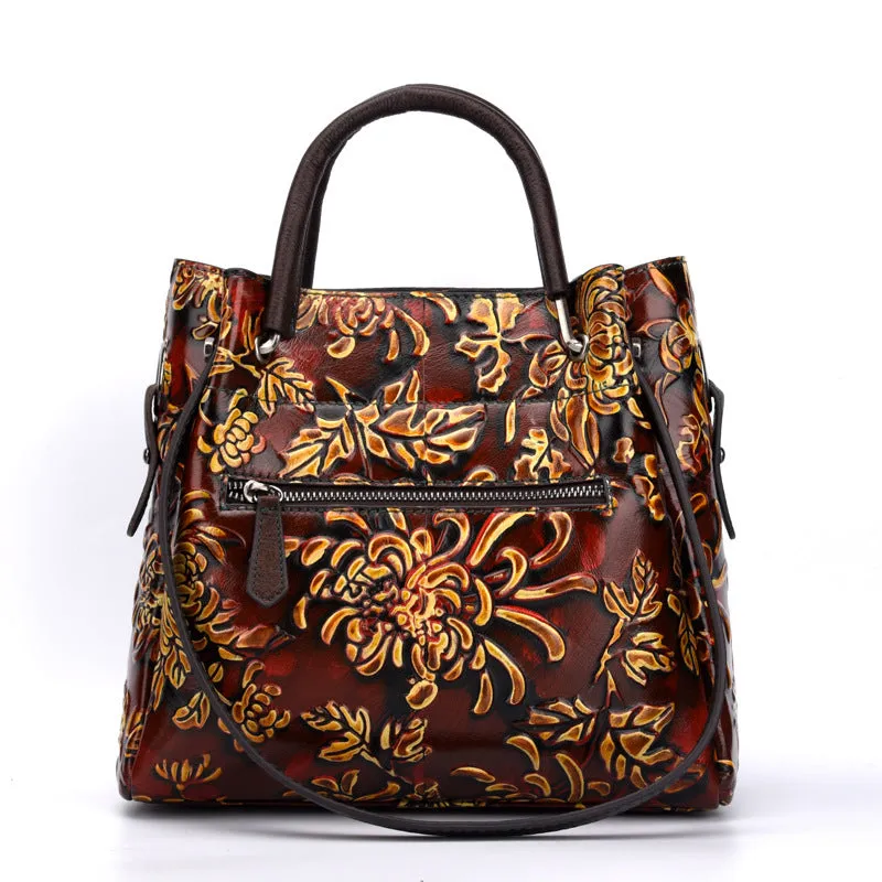 First layer cowhide women's messenger bag with embossed floral pattern, retro square shape, hard handle, and single shoulder strap in brown