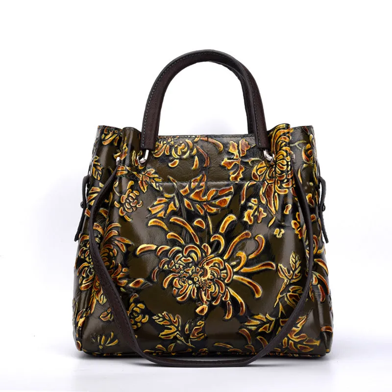 First layer cowhide women's messenger bag with embossed floral pattern, retro square shape, hard handle, and single shoulder strap in brown