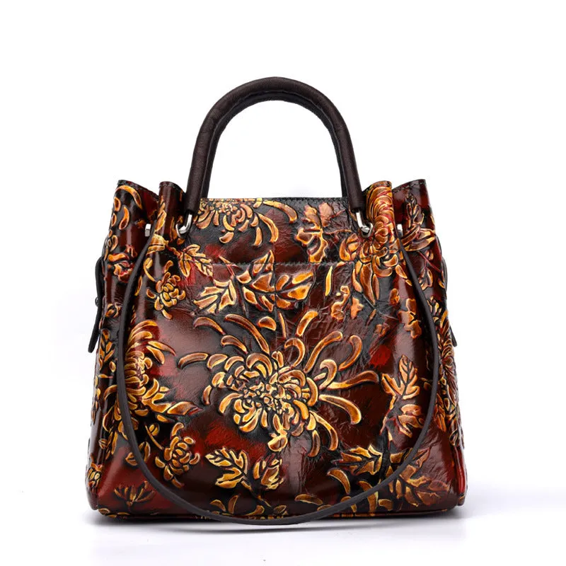 First layer cowhide women's messenger bag with embossed floral pattern, retro square shape, hard handle, and single shoulder strap in brown