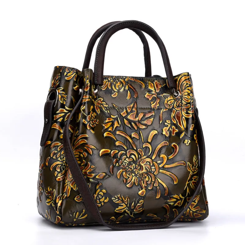 First layer cowhide women's messenger bag with embossed floral pattern, retro square shape, hard handle, and single shoulder strap in brown