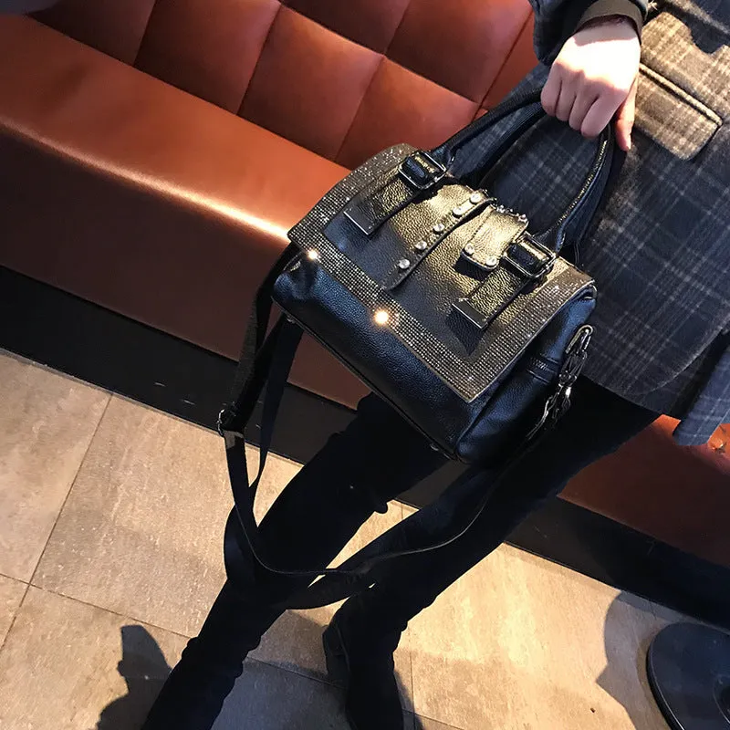 Large soft cowhide leather handbag in black with diamond decoration and lid closure