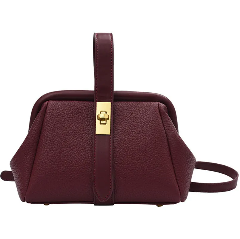 PU leather shoulder bag in cross-square shape with visible sewing line detail, available in four colours