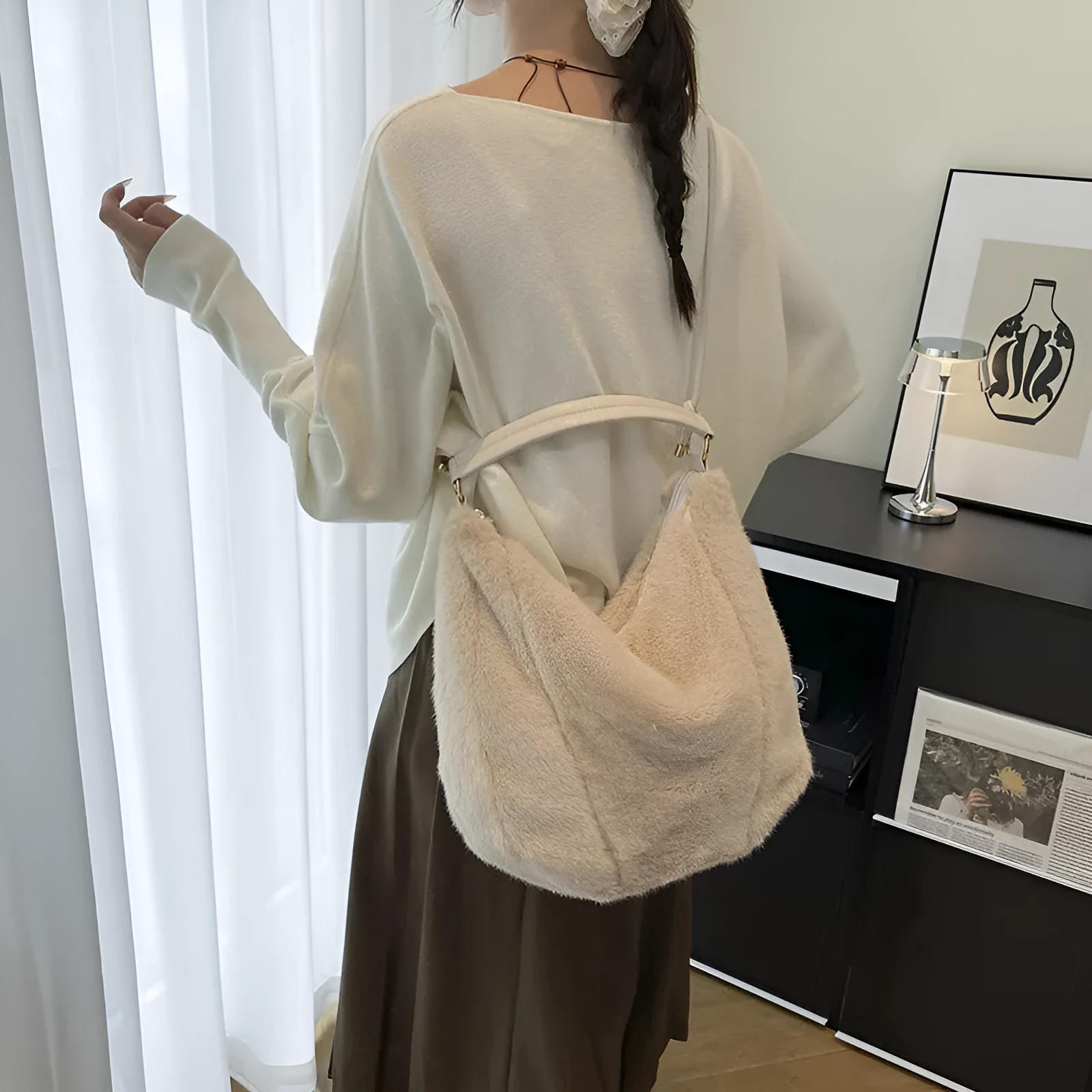 Beige one shoulder underarm bag in plush with splicing details, horizontal square shape, and single strap