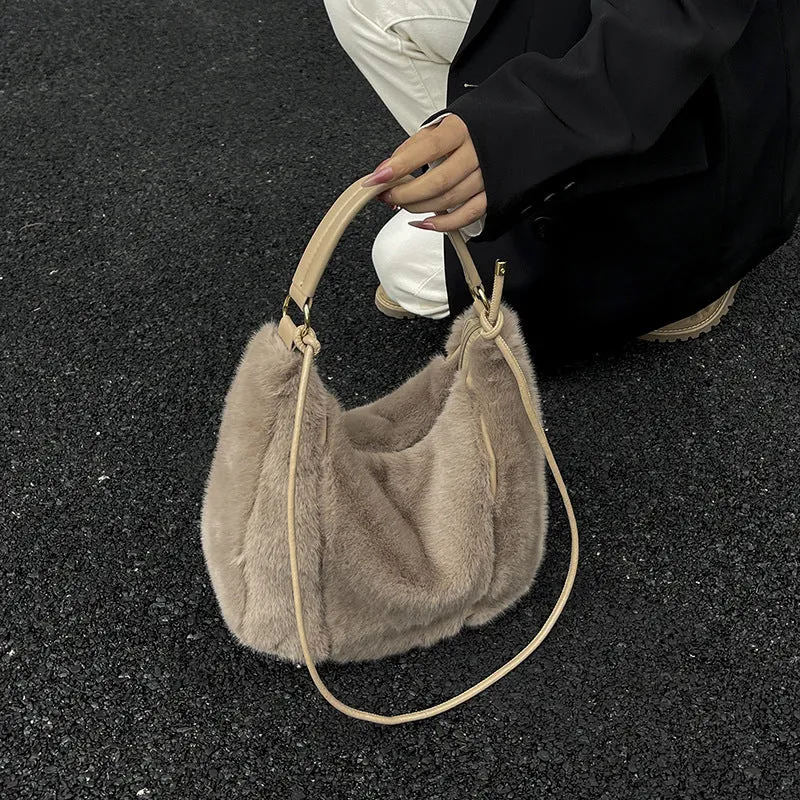 Beige one shoulder underarm bag in plush with splicing details, horizontal square shape, and single strap