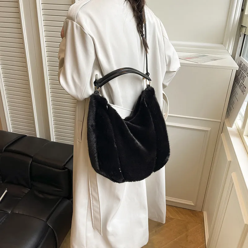 Beige one shoulder underarm bag in plush with splicing details, horizontal square shape, and single strap