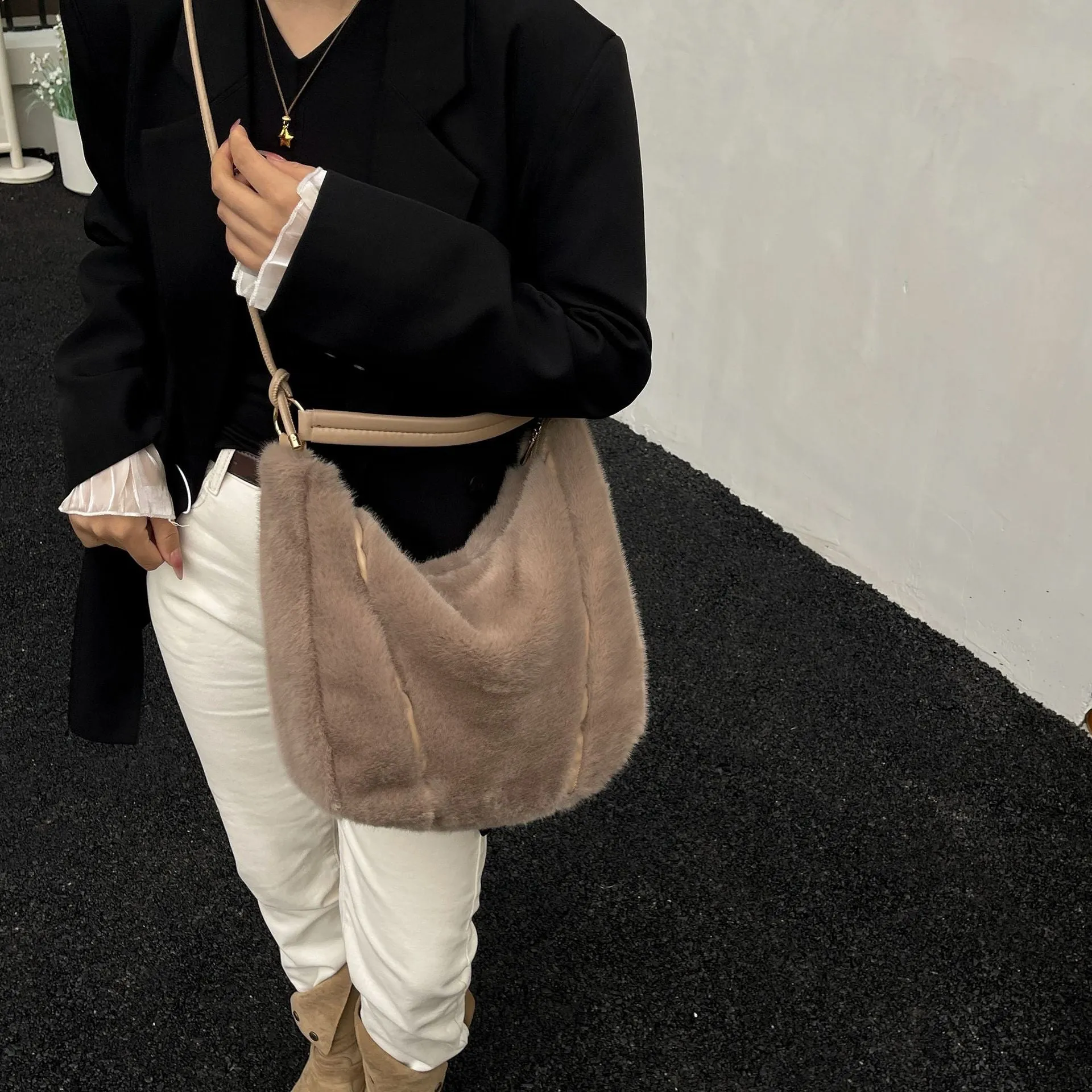 Beige one shoulder underarm bag in plush with splicing details, horizontal square shape, and single strap