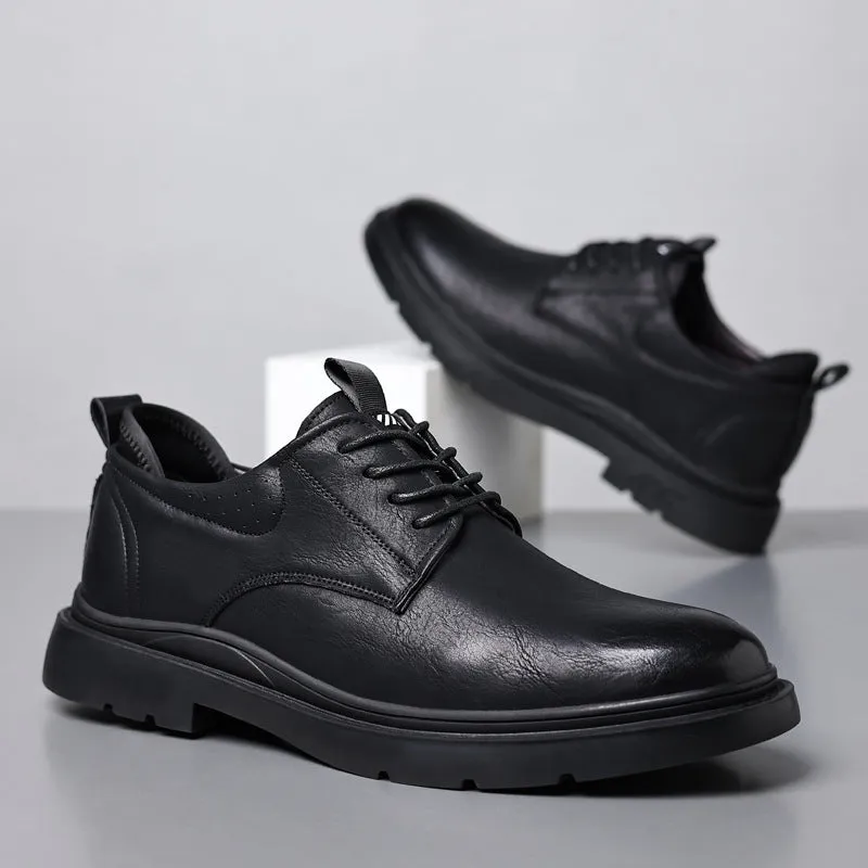 Men's black leather casual sneakers with sewing line detail and a rubber sole.