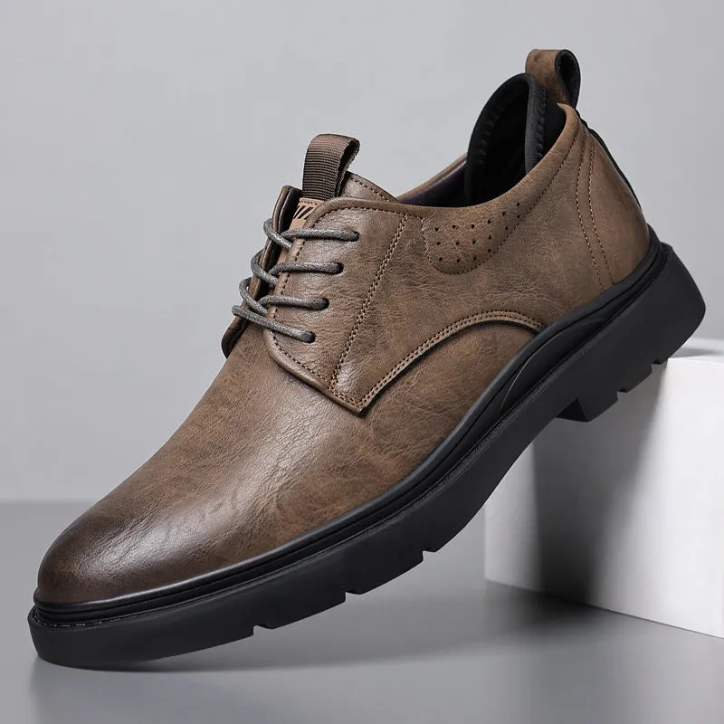 Men's black leather casual sneakers with sewing line detail and a rubber sole.