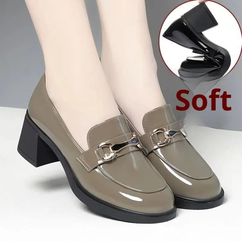 Dark green glossy chunky heel loafers for women with metal buckle and round toe on a white background