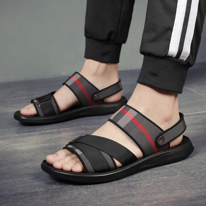 Pair of youth sports sandals with a blue Lycra upper and light polyurethane sole.