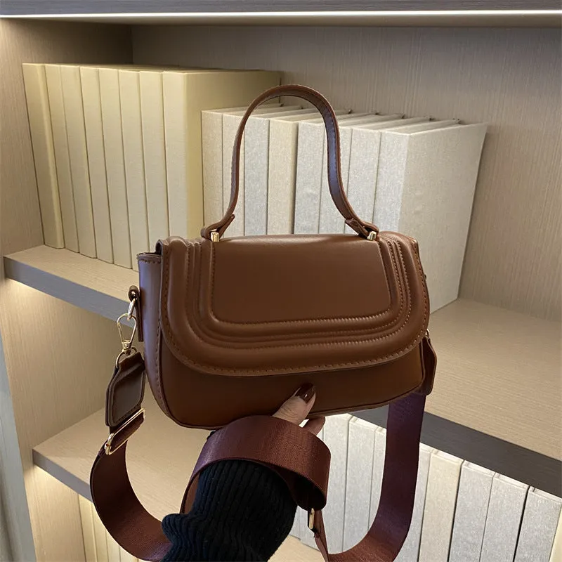 Women's casual PU one-shoulder crossbody bag in black with urban simplicity sewing line detail and sandwich pocket