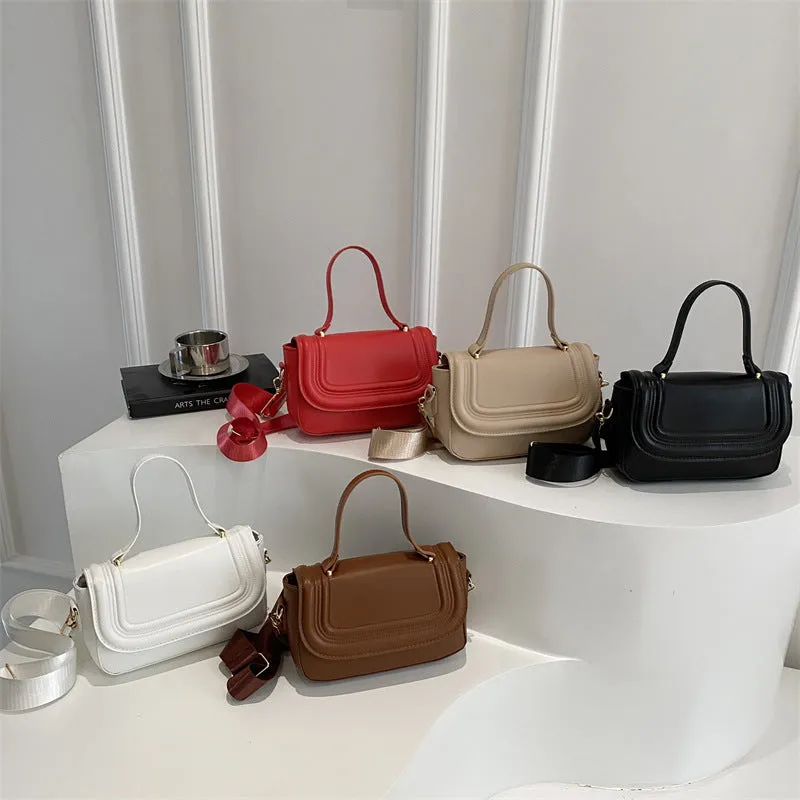 Women's casual PU one-shoulder crossbody bag in black with urban simplicity sewing line detail and sandwich pocket