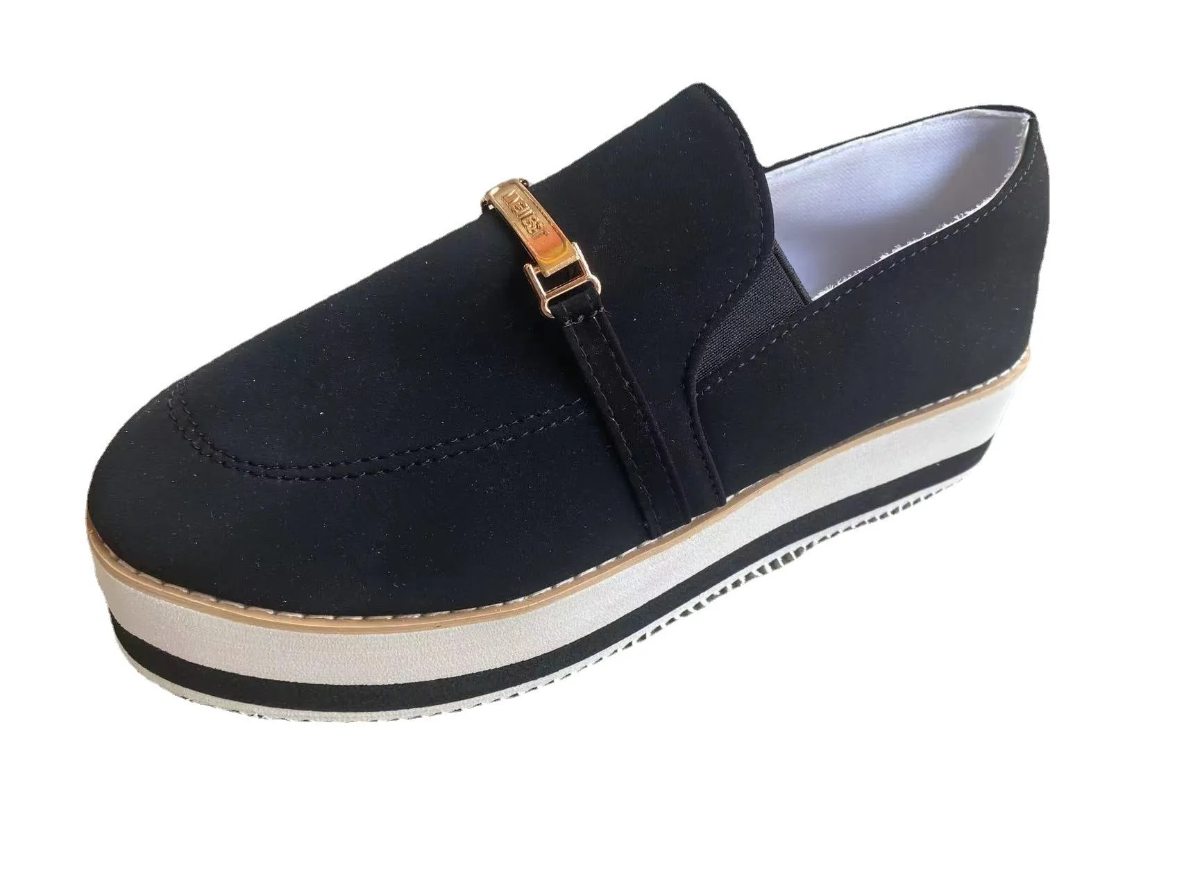 Women's black slip-on flat platform sneakers with round toe and low heel