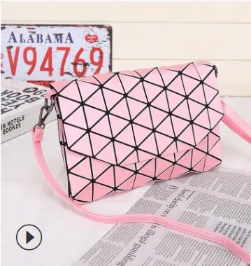 Rhombic ABS shoulder bag in envelope style, available in multiple colours including black and pink.