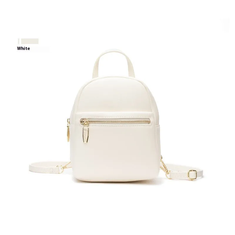 Soft PU mini backpack in street trend style with multiple internal compartments including mobile phone pocket
