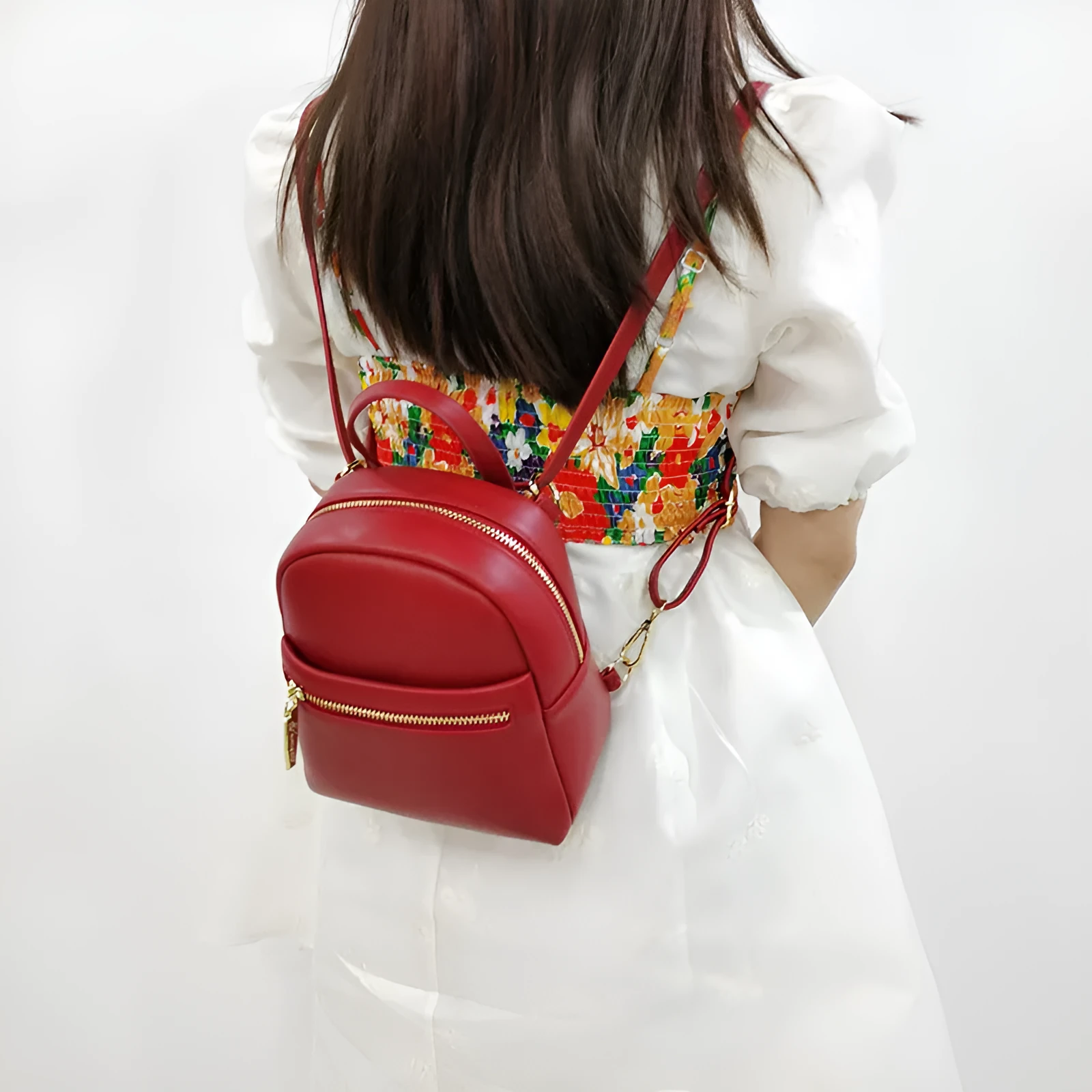 Soft PU mini backpack in street trend style with multiple internal compartments including mobile phone pocket