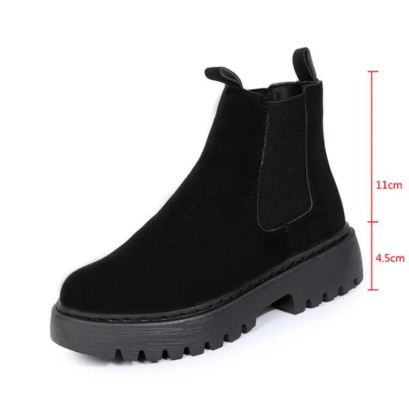 Women's Martin boots in solid colour with chunky platform sole, flat heel, and leather stitching