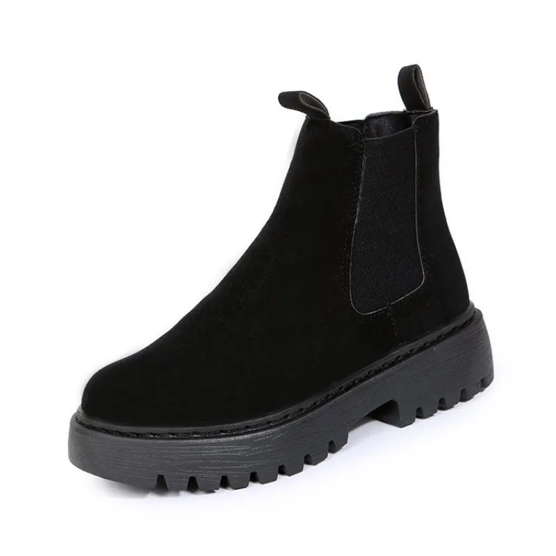 Women's Martin boots in solid colour with chunky platform sole, flat heel, and leather stitching
