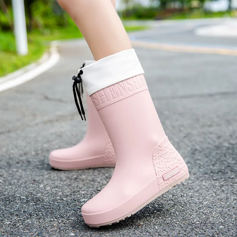 Women's solid colour rain boots with non-slip soles in apricot, black, brown, and pink waterproof finishes