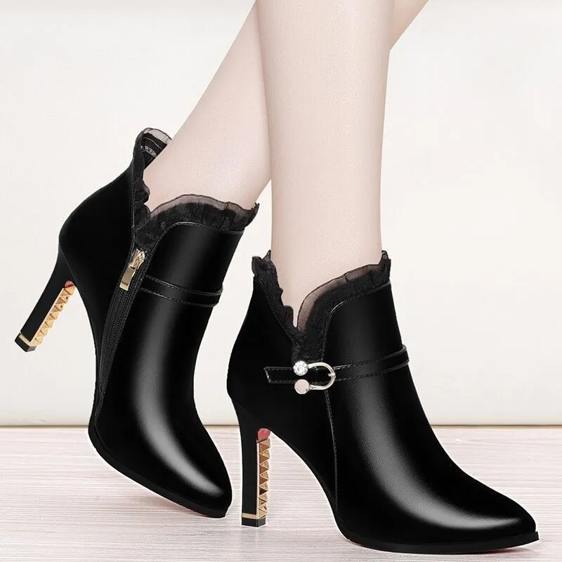 Women's over-the-knee black stiletto heel boots with side zipper and pointed toe