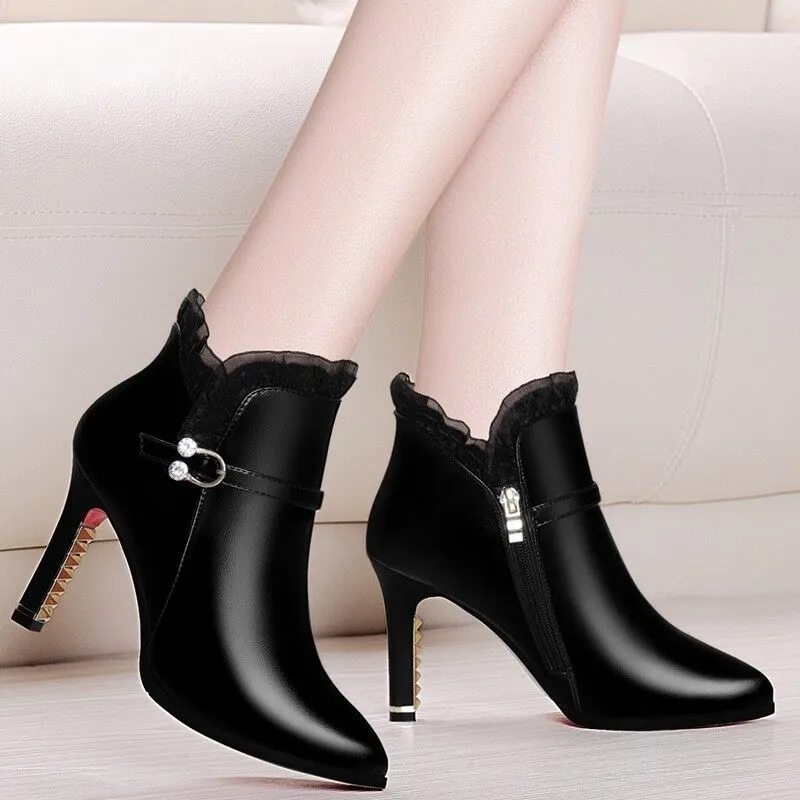Women's over-the-knee black stiletto heel boots with side zipper and pointed toe